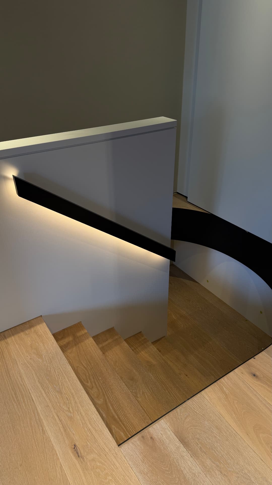 Staircase with sealed balustrade, wall and timber floor joints
