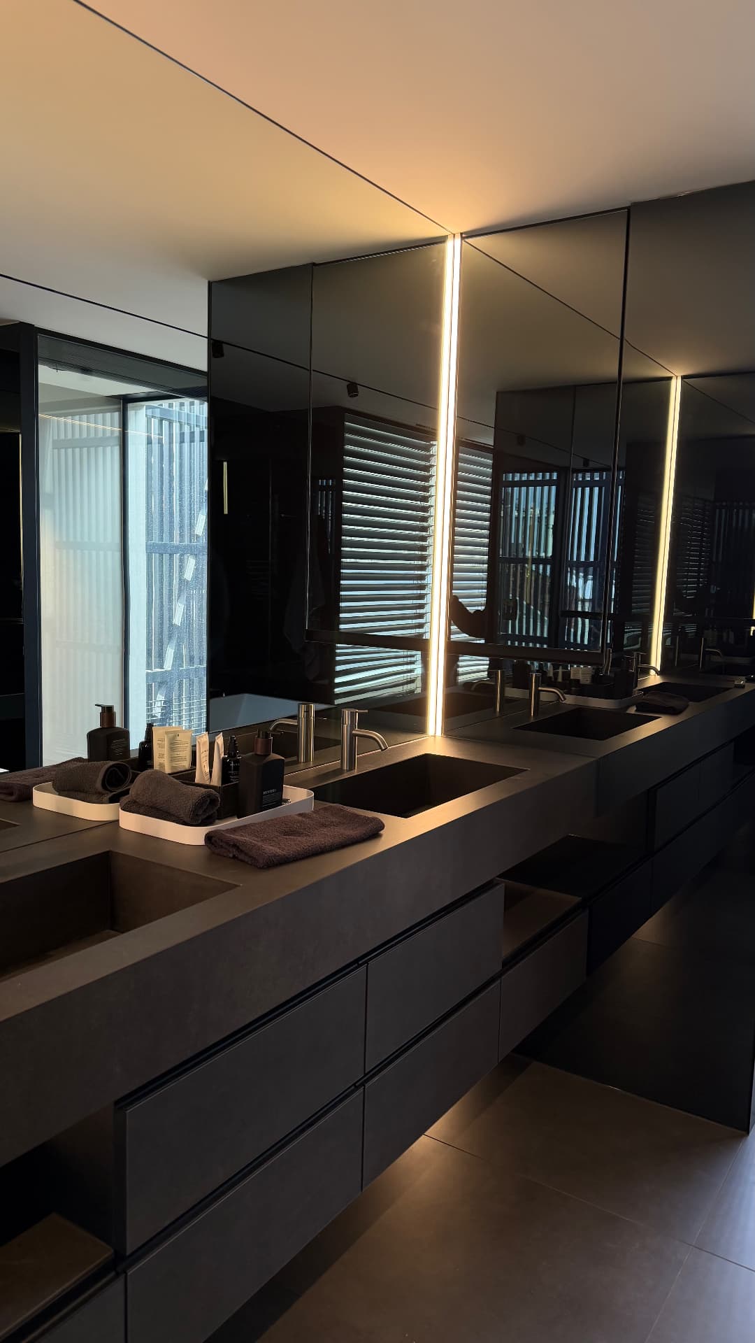 Sealed dark stone vanity benchtop with double basins