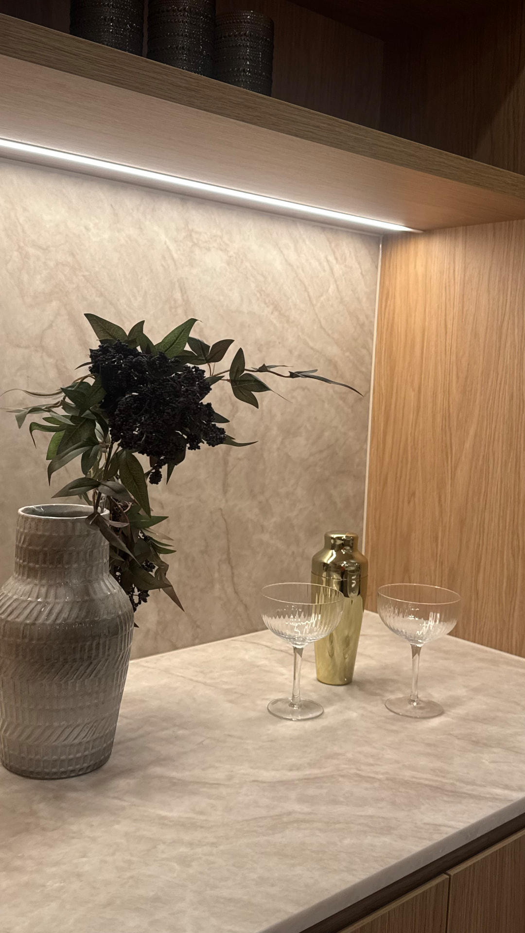 Bar nook with sealed stone benchtop and splashback junction