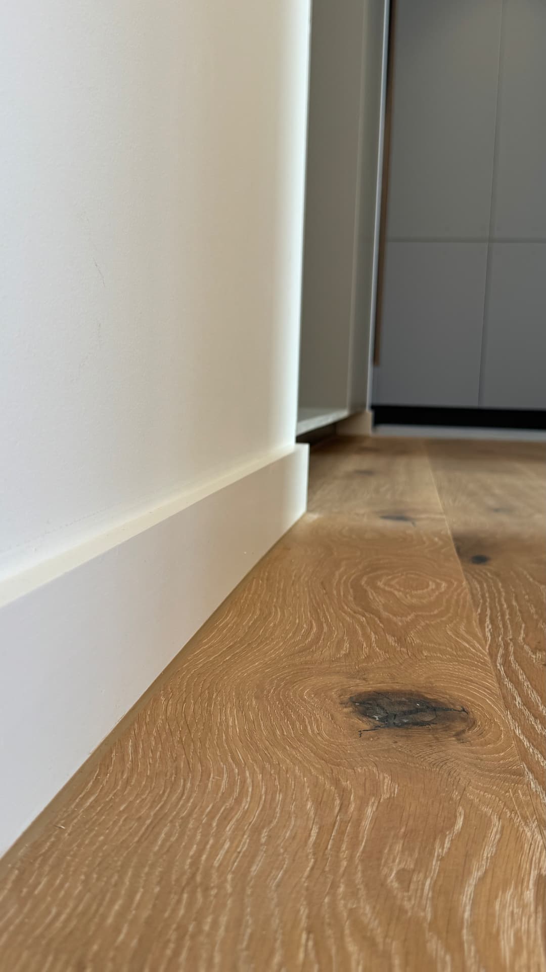 Skirting board sealed neatly to timber flooring