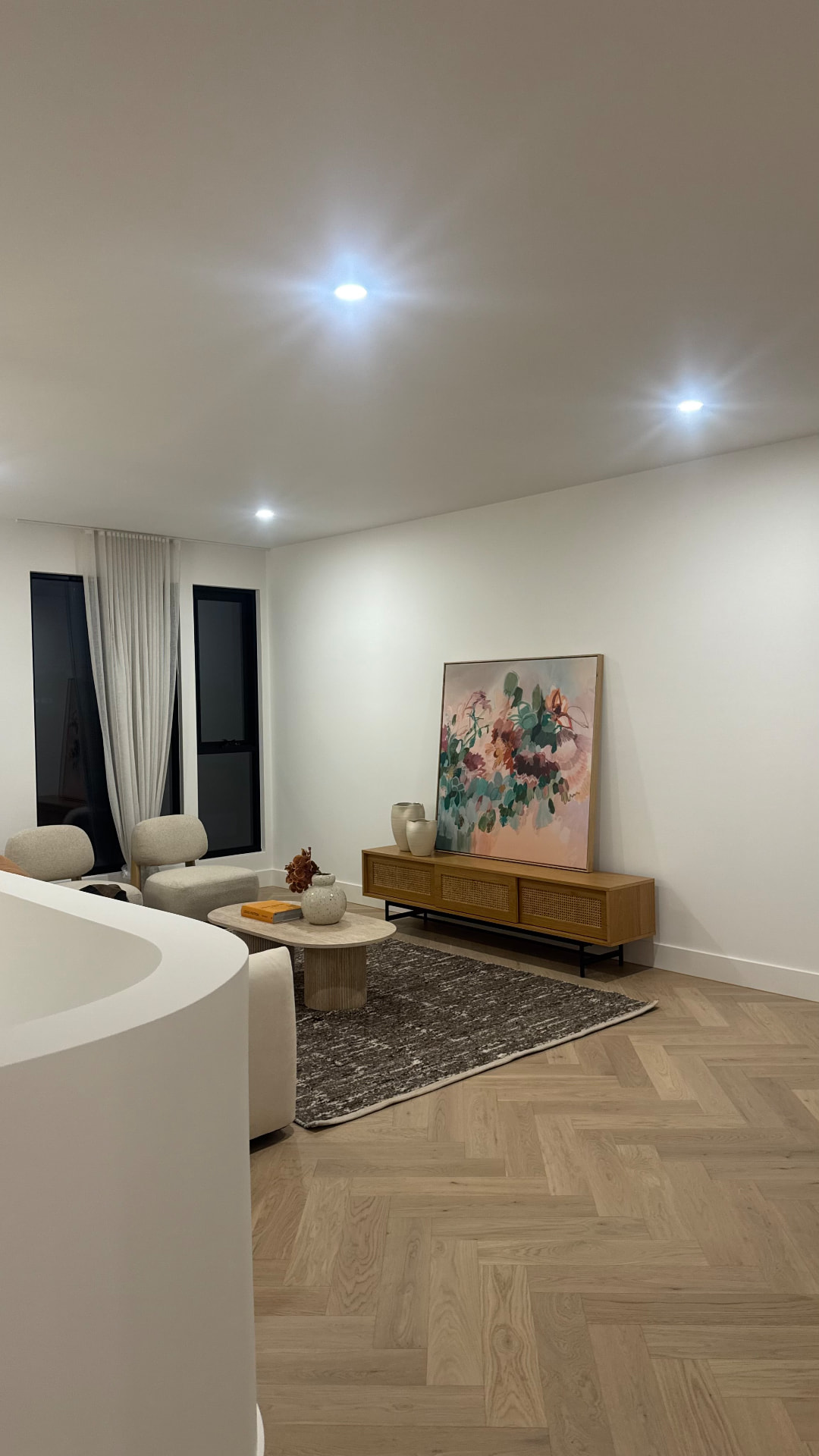 Living room with sealed skirting boards and herringbone timber floor