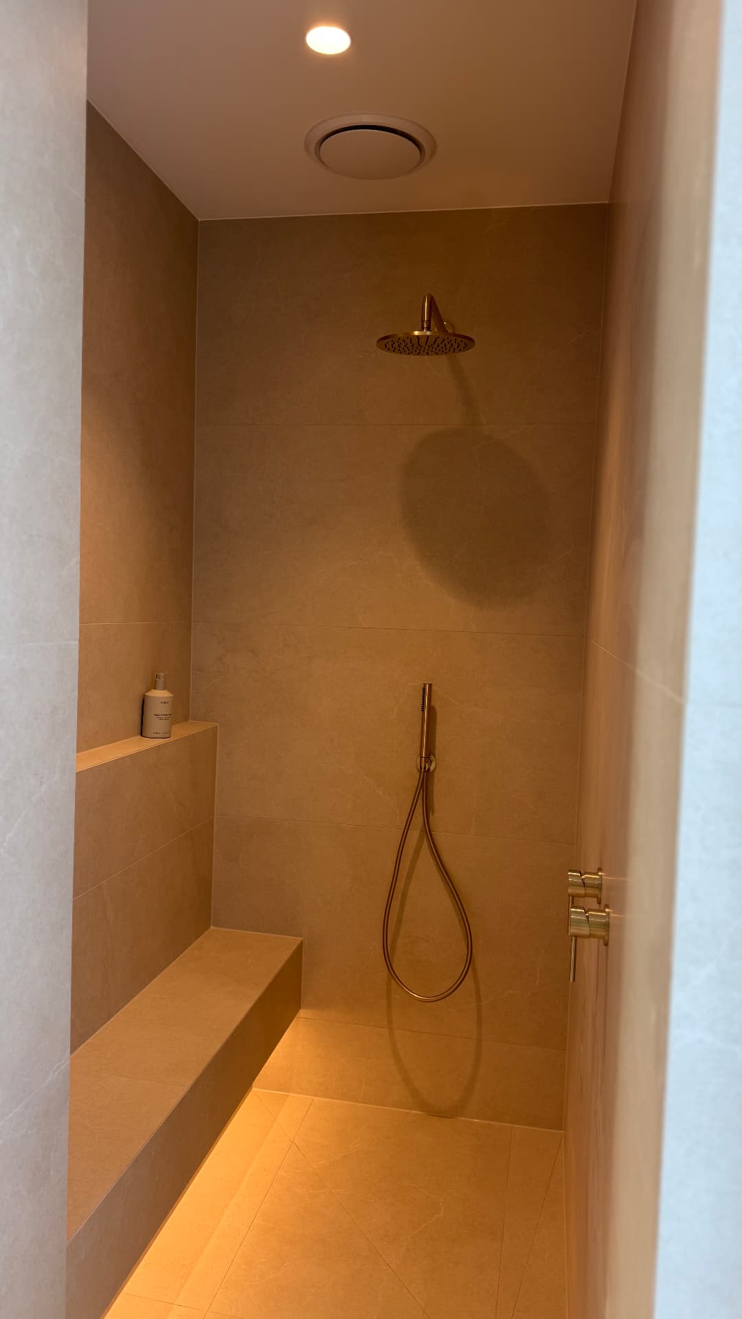 Shower with sealed bench seat, walls and floor junctions