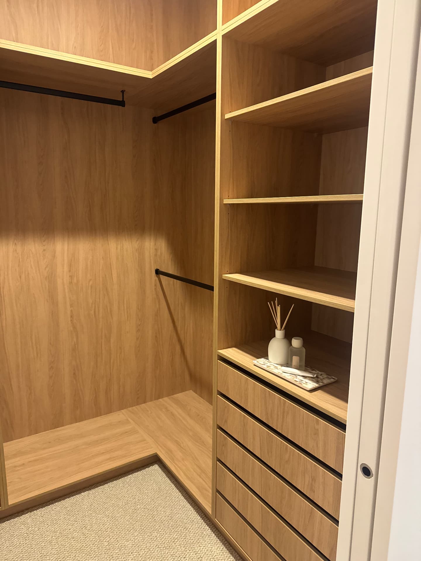 Walk-in robe with sealed joinery, shelving and wall junctions