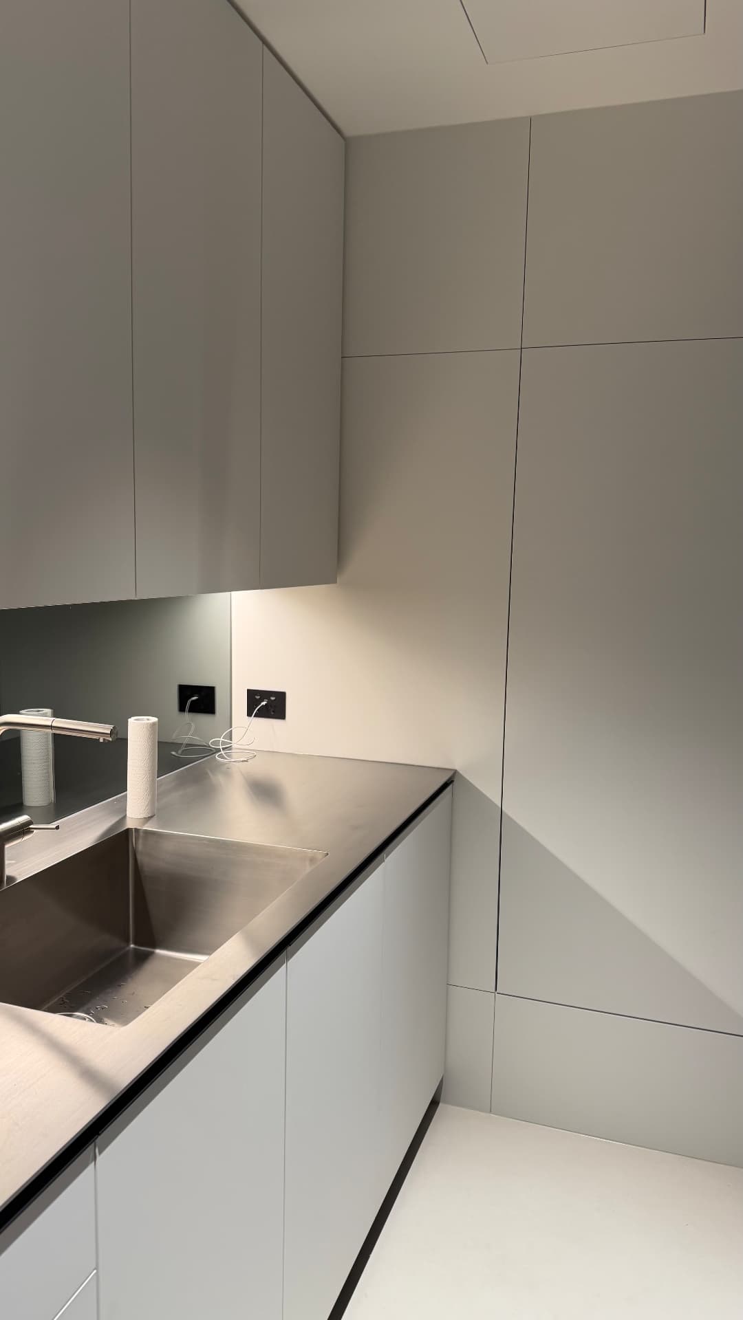 Butler's pantry with sealed stainless benchtop and cabinetry joints