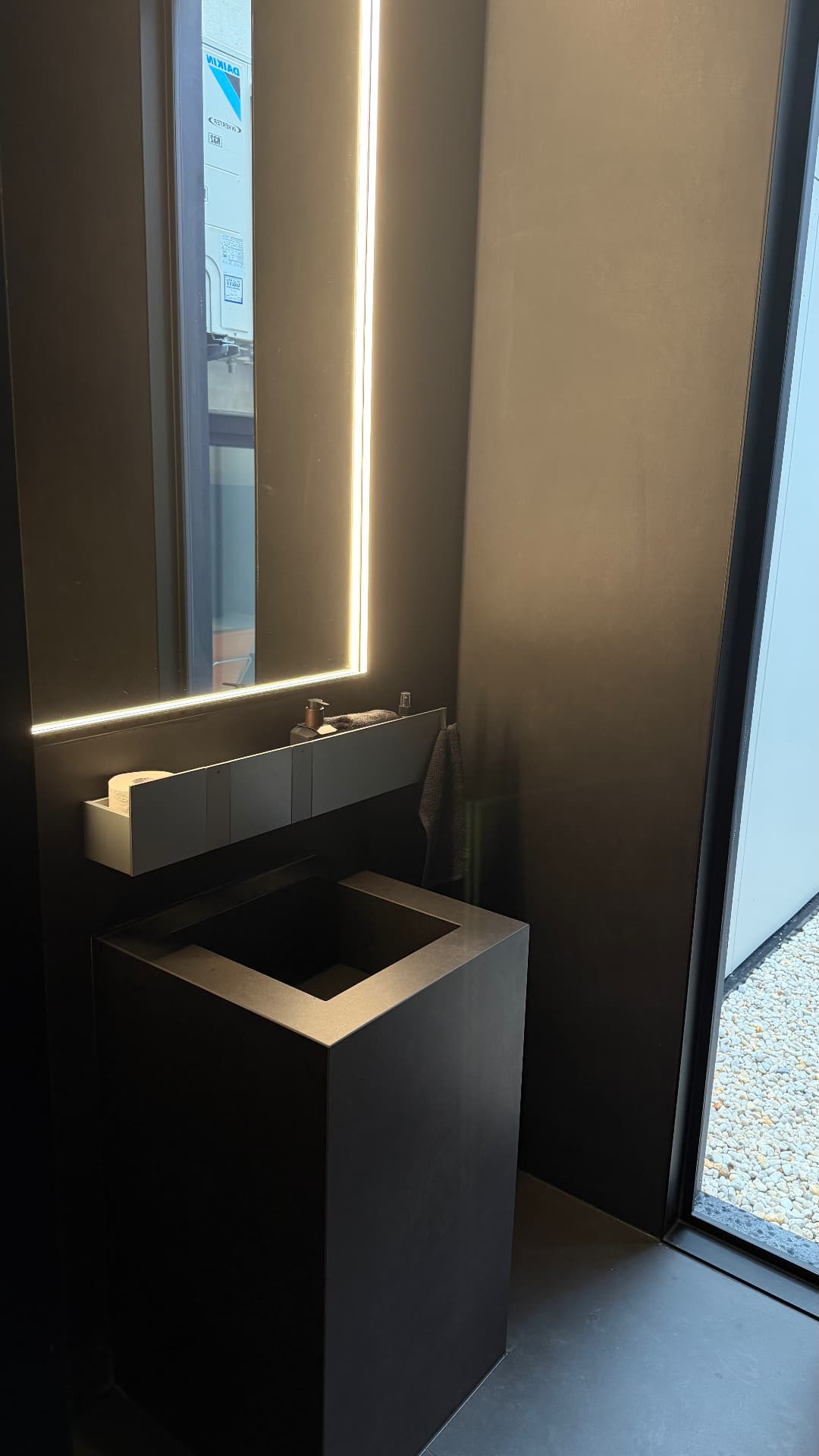 Sealed pedestal basin and wall panel joints